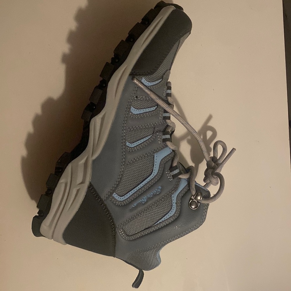 Size 8 Hiking boots, only worn them once. Will sanitize before sending.